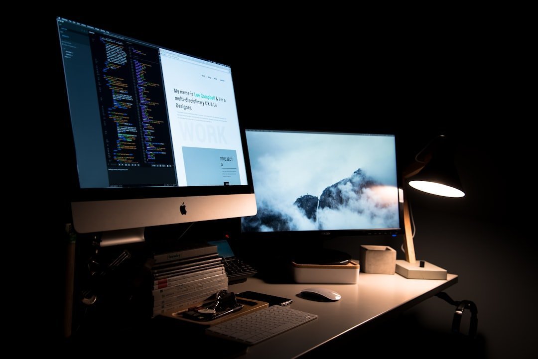 Creative workspace with desktop screens